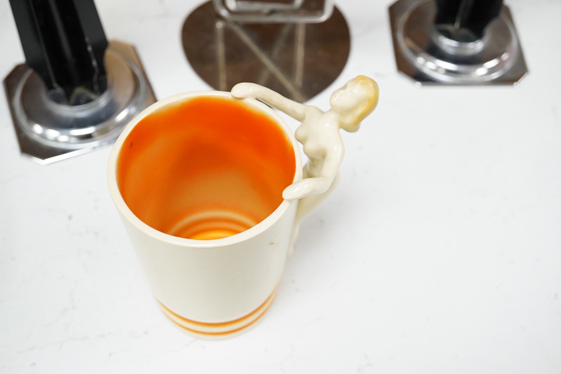 A 1960s Danish Modernist four light candelabrum, a 1940s pair of candlesticks and a West German mug, largest 37cm high
